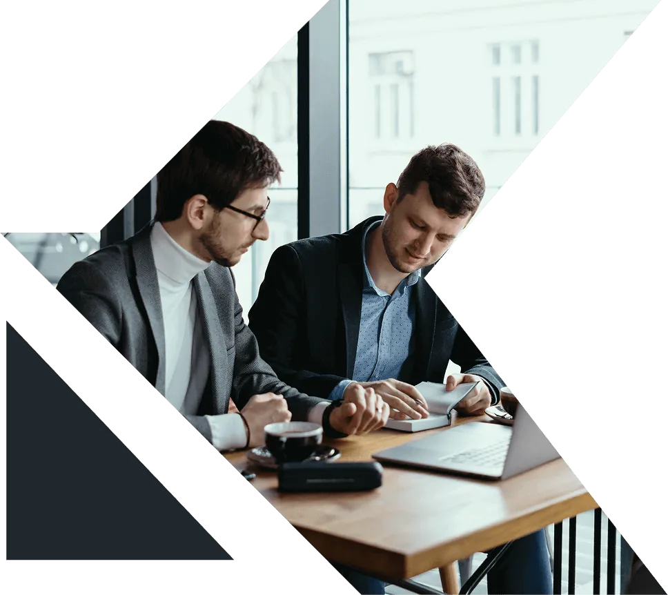 Friendly Infotech team discussing a client project